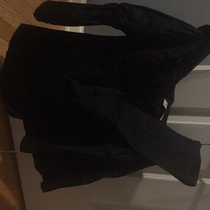 Off the shoulder black polyester top.